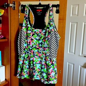 Exercise top by spanx sz L but runs small